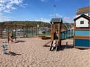 Bryggkiosken in Hamburgsund summer kiosk by the sea with people and boats